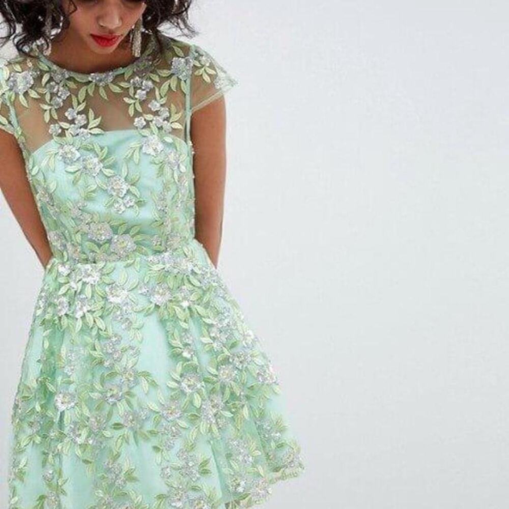 Green floral embroidered mini dress with cap sleeves and a flared skirt